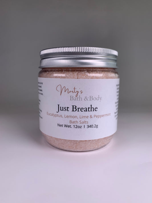 Front view of a 12oz jar of Just Breathe all natural bath salts/bath soak.