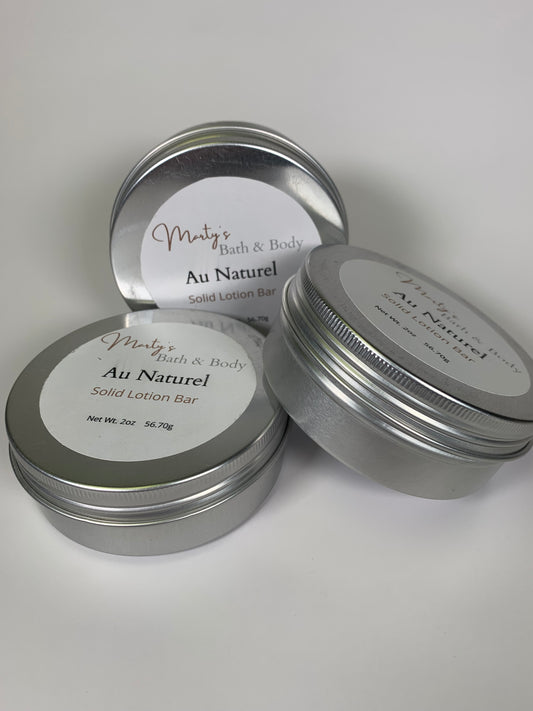 Au Naturel, zero waste solid lotion bar in reusable aluminum container.