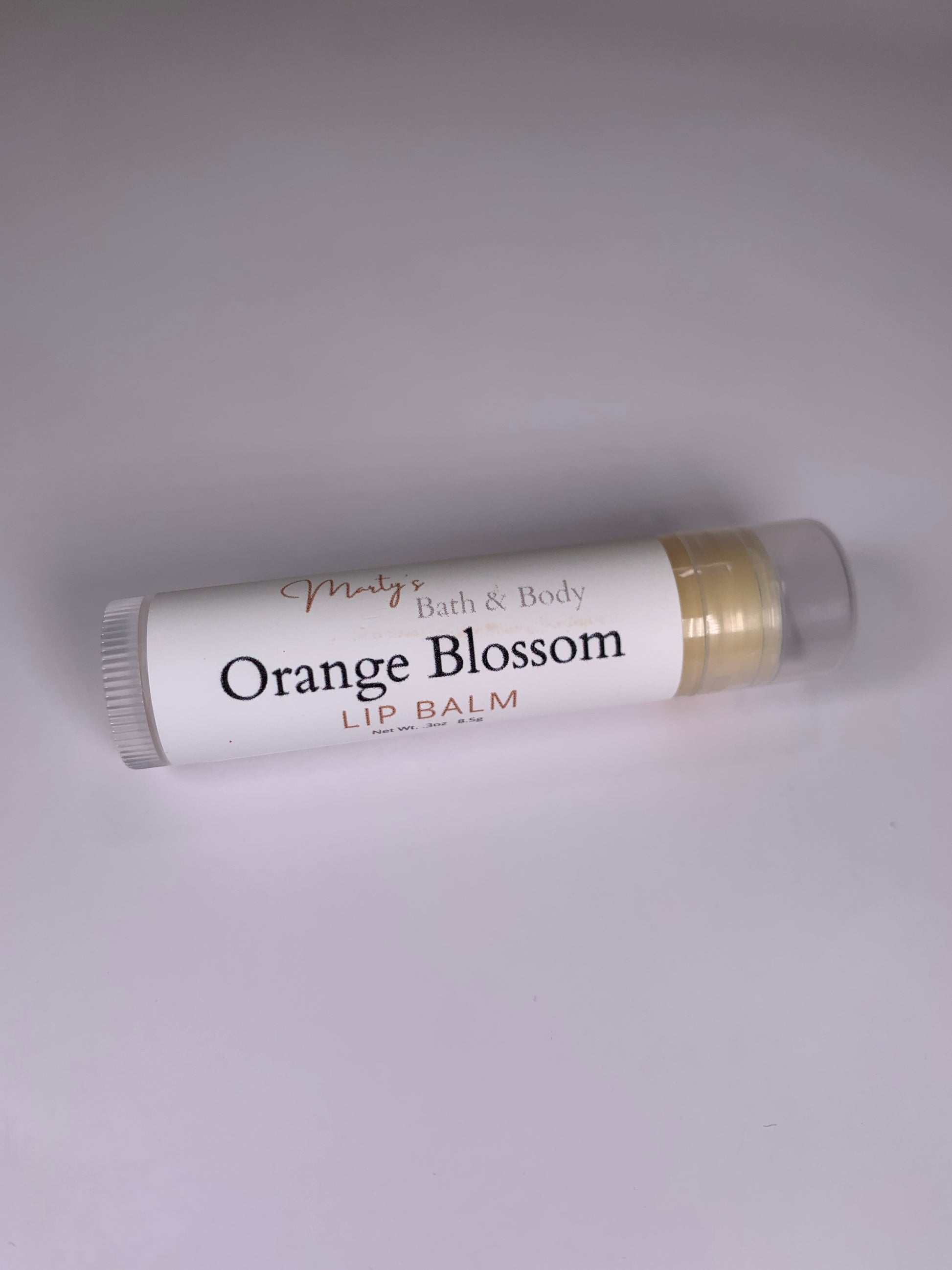 One tube of Orange Blossom naturally flavored lip balm.