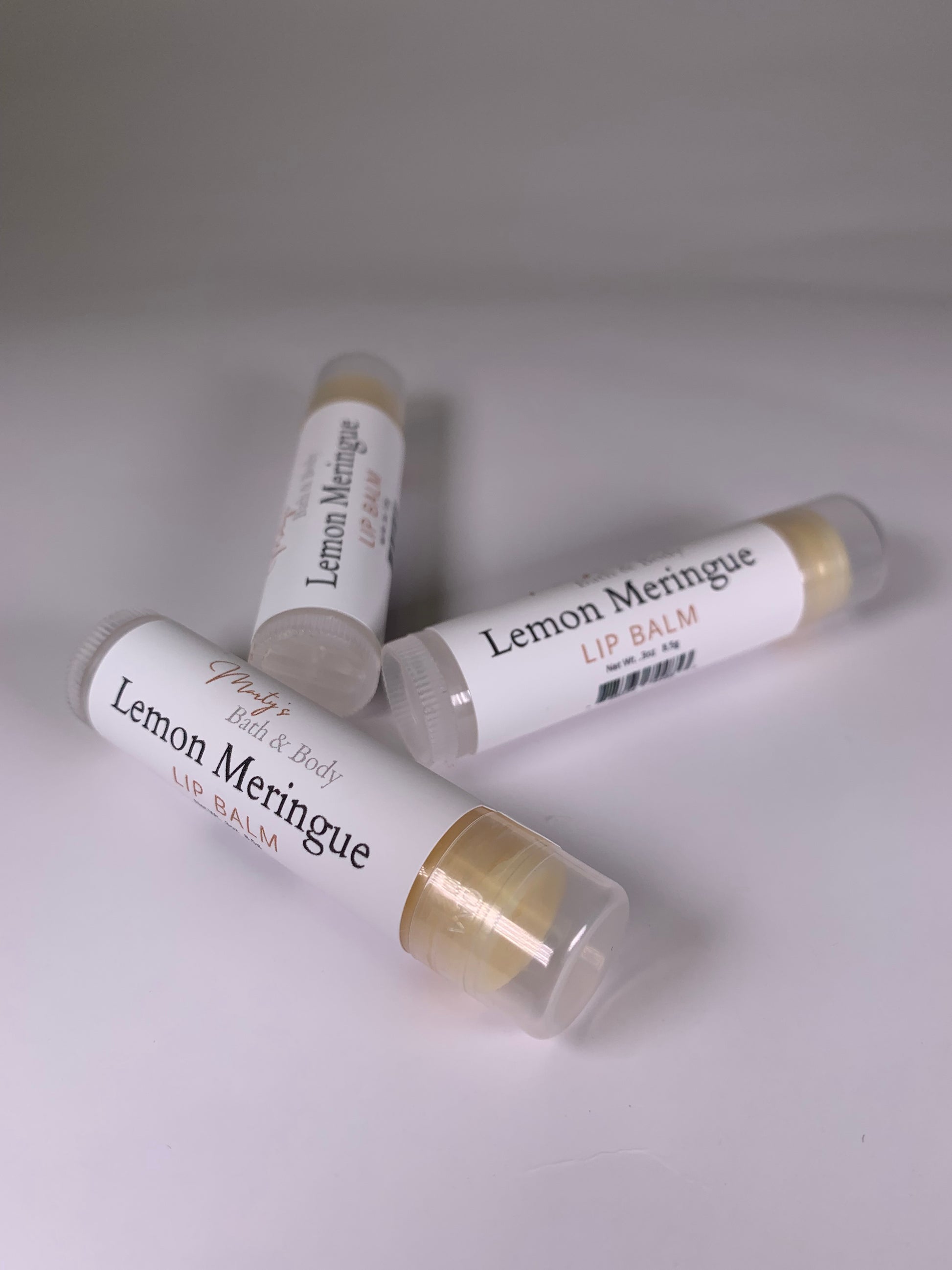 Three lemon meringue flavored lip balms. Handmade, all natural.