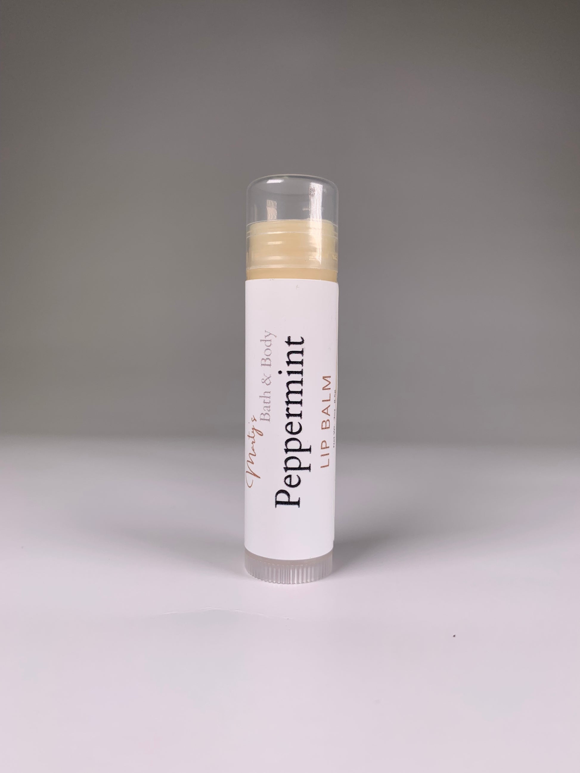 One tube of peppermint flavored all natural lip balm.