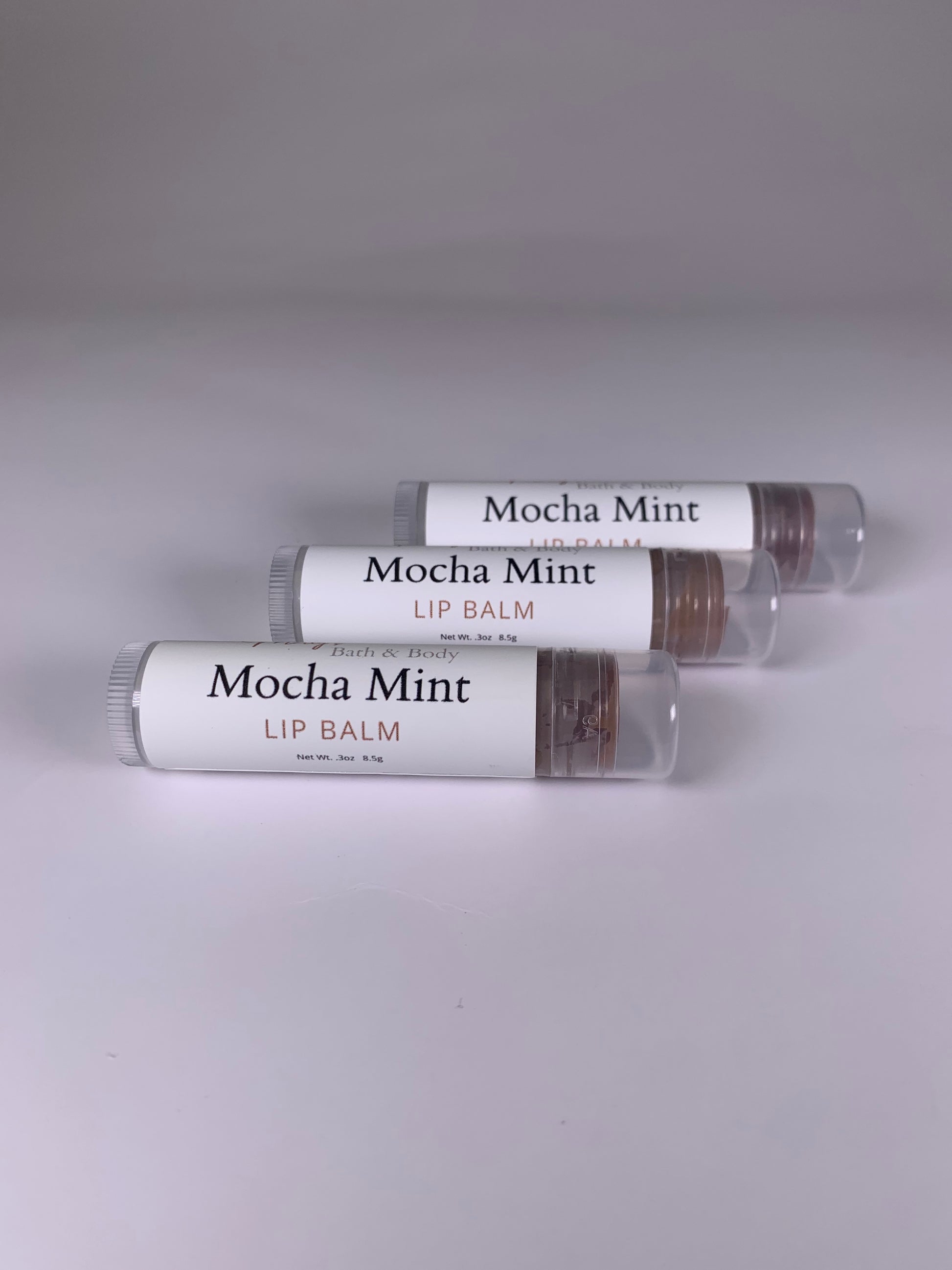 Three naturally mocha and mint flavored lip balms.