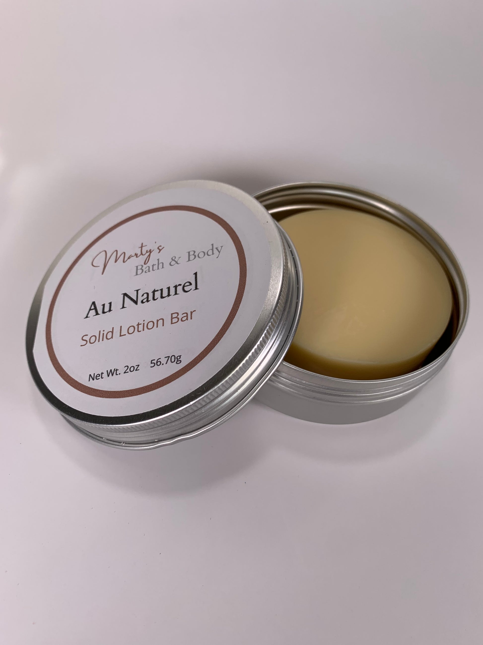 All natural, zero waste, solid lotion bar. In Au Naturel unscented.